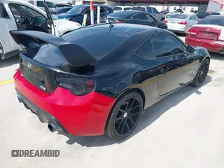 2014 Scion FR-S z VIN JF1ZNAA10E8703778, wystawiony jako IAAI lot #42264695 z przebiegiem 117 889 mil mil oraz . Historia ofert i sprzedaży dostępna na DreamBid. Obrazek 4.