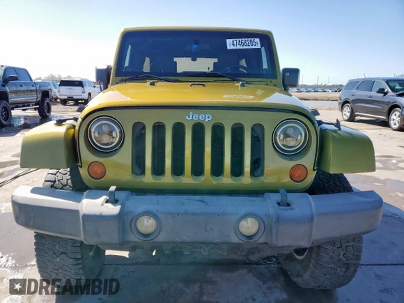 2007 Jeep Wrangler Unlimited Sahara z VIN 1J4GB591X7L165493, wystawiony jako Copart lot #47468205 z przebiegiem Nie podano mil oraz Czysty tytuł • Clean title. Historia ofert i sprzedaży dostępna na DreamBid. Obrazek 5.
