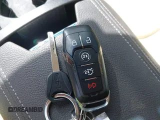 2014 Lincoln MKZ with VIN 3LN6L2G91ER832211, listed as a IAAI auction lot 41770905 with 63,417 mi miles and . Bid and sale history available at DreamBid. Image 11.