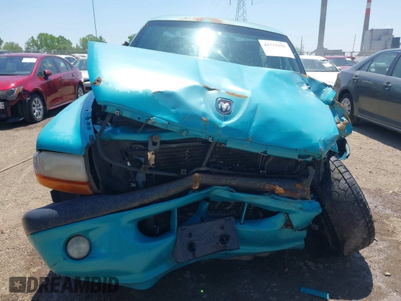 1997 Dodge Dakota z VIN 1B7GG26Y5VS253054, wystawiony jako IAAI lot #42215925 z przebiegiem 125 768 mil mil oraz . Historia ofert i sprzedaży dostępna na DreamBid. Obrazek 12.
