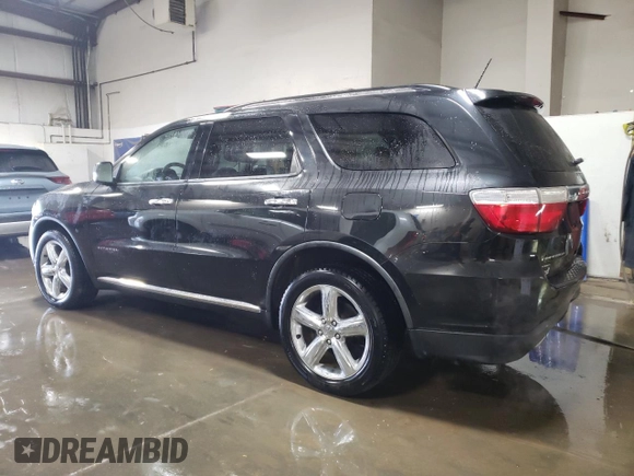 2012 Dodge Durango Citadel with VIN 1C4SDJET7CC183017, listed as a Copart auction lot 83441934 with 183,568 mi miles and Salvage Title. Bid and sale history available at DreamBid. Image 2.