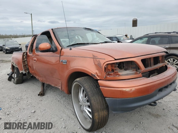 1999 Ford F-150 XL with VIN 1FTRX08L7XKB50493, listed as a Copart auction lot 79948554 with Not provided miles and Non repairable. Bid and sale history available at DreamBid. Image 4.