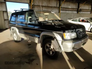 2000 Isuzu Trooper S with VIN JACDJ58X2Y7J03502, listed as a Copart auction lot 41897665 with 183,081 mi miles and Clean title. Bid and sale history available at DreamBid. Image 4.