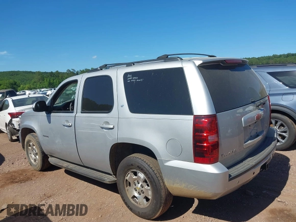 2014 Chevrolet Tahoe LT with VIN 1GNSCBE00ER147899, listed as a IAAI auction lot 42322761 with 299,342 mi miles and . Bid and sale history available at DreamBid. Image 14.
