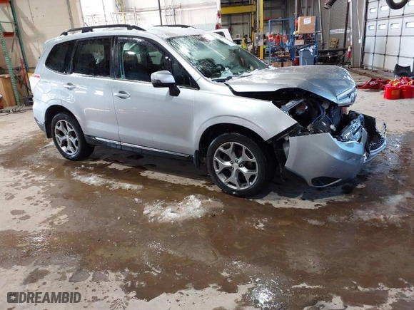 2015 Subaru Forester 2.5i Touring with VIN JF2SJAUCXFH471892, listed as a IAAI auction lot 41314722 with 94,717 mi miles. Bid and sale history available at carsss.com. Image 1.