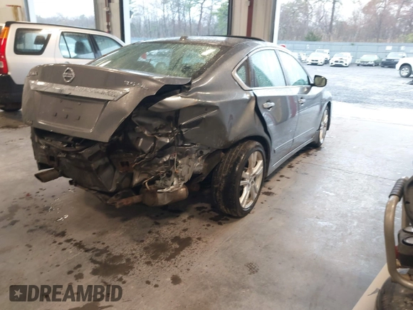 2015 Nissan Altima SL with VIN 1N4BL3AP0FC213069, listed as a IAAI auction lot 41931428 with 172,215 mi miles and . Bid and sale history available at carsss.com. Image 4.