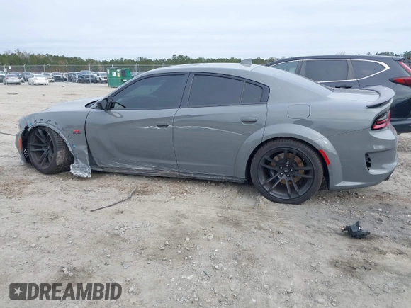 2023 Dodge Charger Scat Pack Widebody with VIN 2C3CDXGJ6PH646050, listed as a IAAI auction lot 41175513 with 7,684 mi miles and . Bid and sale history available at DreamBid. Image 14.