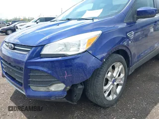 2013 Ford Escape SE with VIN 1FMCU0GXXDUA71589, listed as a IAAI auction lot 42122707 with 144,972 mi miles and . Bid and sale history available at carsss.com. Image 6.