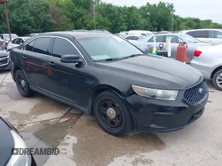 2014 Ford Police Interceptor z VIN 1FAHP2MK6EG182636, wystawiony jako IAAI lot #42430388 z przebiegiem 147 303 mil mil oraz . Historia ofert i sprzedaży dostępna na DreamBid. Obrazek 1.