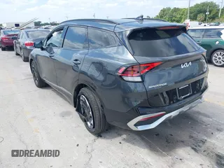 2024 Kia Sportage SX-Prestige with VIN 5XYK53DF6RG228361, listed as a IAAI auction lot 42102412 with 14,496 mi miles and . Bid and sale history available at DreamBid. Image 3.