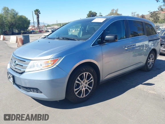 2012 Honda Odyssey EX-L with VIN 5FNRL5H69CB003067, listed as a IAAI auction lot 41862591 with 163,158 mi miles and . Bid and sale history available at carsss.com. Image 17.