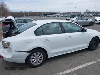 2014 Volkswagen Jetta Sedan S with VIN 3VW2K7AJ5EM329328, listed as a IAAI auction lot 41995084 with 72,409 mi miles. Bid and sale history available at carsss.com. Image 14.
