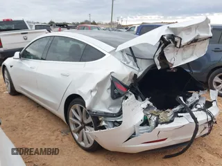 2020 Tesla Model 3 Standard Range Plus with VIN 5YJ3E1EA1LF738062, listed as a IAAI auction lot 41747581 with 41,897 mi miles. Bid and sale history available at carsss.com. Image 3.