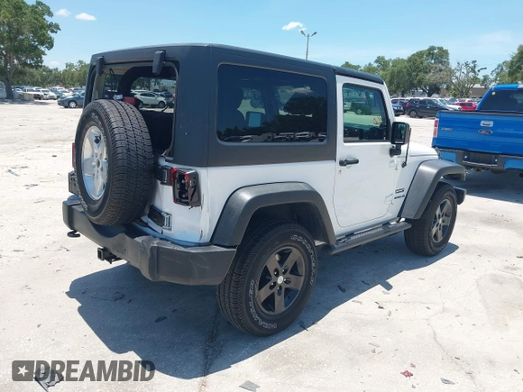 2013 Jeep Wrangler Sport with VIN 1C4AJWAG0DL542624, listed as a IAAI auction lot 42590160 with 54,850 mi miles and . Bid and sale history available at DreamBid. Image 4.