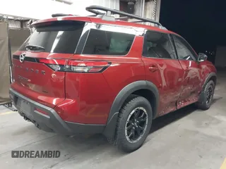 2023 Nissan Pathfinder Rock Creek with VIN 5N1DR3BD7PC276625, listed as a IAAI auction lot 42226402 with 11,872 mi miles and . Bid and sale history available at DreamBid. Image 4.