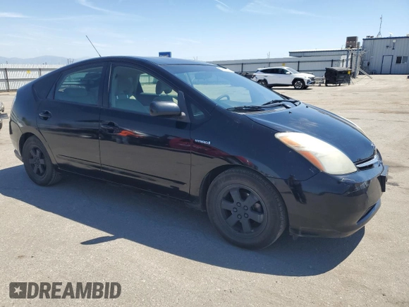 2007 Toyota Prius with VIN JTDKB20U677618684, listed as a Copart auction lot 54049295 with 219,866 mi miles and Clean Title. Bid and sale history available at carsss.com. Image 4.