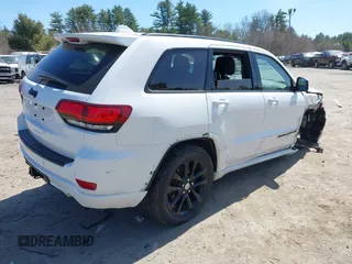 2021 Jeep Grand Cherokee Freedom with VIN 1C4RJFAG0MC856308, listed as a IAAI auction lot 42050995 with 35,428 mi miles and . Bid and sale history available at DreamBid. Image 4.