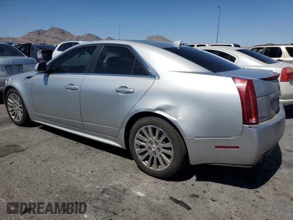 2013 Cadillac CTS Premium with VIN 1G6DP5E3XD0124816, listed as a Copart auction lot 57612365 with 180,713 mi miles and Salvage title. Bid and sale history available at DreamBid. Image 2.