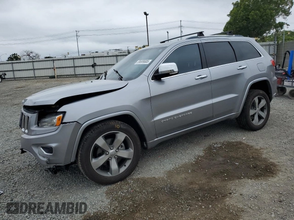 2015 Jeep Grand Cherokee Overland with VIN 1C4RJECG4FC808241, listed as a Copart auction lot 59699685 with 67,542 mi miles and Salvage title. Bid and sale history available at DreamBid. Image 1.