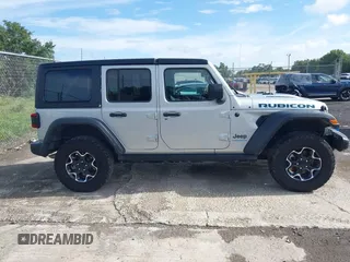 2023 Jeep Wrangler Rubicon with VIN 1C4JJXR63PW703424, listed as a IAAI auction lot 42639653 with 46,412 mi miles and . Bid and sale history available at DreamBid. Image 12.