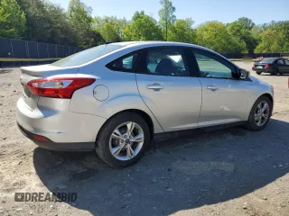 2013 Ford Focus SE with VIN 1FADP3F27DL207986, listed as a Copart auction lot 54608055 with 128,081 mi miles and Salvage title. Bid and sale history available at DreamBid. Image 3.