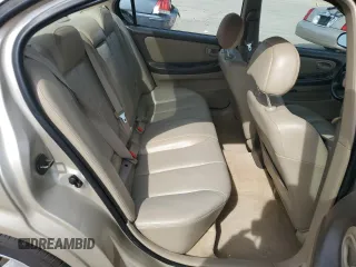 2001 Nissan Maxima GXE z VIN JN1CA31D91T834431, wystawiony jako Copart lot #72933854 z przebiegiem 105 249 mil mil oraz Czysty tytuł • Clean title. Historia ofert i sprzedaży dostępna na DreamBid. Obrazek 10.