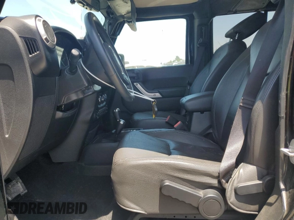 2017 Jeep Wrangler Unlimited Sahara with VIN 1C4BJWEG3HL614632, listed as a Copart auction lot 57525545 with 75,973 mi miles and Salvage title. Bid and sale history available at DreamBid. Image 7.
