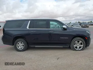 2023 Chevrolet Suburban Premier z VIN 1GNSKFKD2PR266705, wystawiony jako IAAI lot #42578313 z przebiegiem Nie podano mil oraz . Historia ofert i sprzedaży dostępna na DreamBid. Obrazek 13.