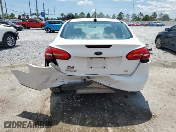 2018 Ford Focus SE with VIN 1FADP3F23JL245856, listed as a Copart auction lot 62343745 with 51,076 mi miles and Salvage title. Bid and sale history available at DreamBid. Image 6.