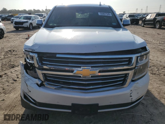 2017 Chevrolet Suburban Premier with VIN 1GNSCJKCXHR348044, listed as a Copart auction lot 55957535 with 112,131 mi miles and Salvage title. Bid and sale history available at DreamBid. Image 5.