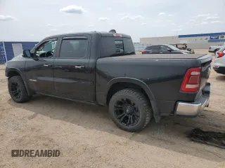 2019 Ram 1500 Laramie with VIN 1C6SRFJTXKN714855, listed as a Copart auction lot 58765625 with Not provided miles and Salvage title. Bid and sale history available at DreamBid. Image 2.