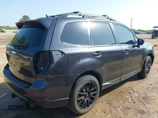 2015 Subaru Forester 2.0XT Premium with VIN JF2SJGDC4FH466111, listed as a IAAI auction lot 41900861 with 142,898 mi miles. Bid and sale history available at carsss.com. Image 4.