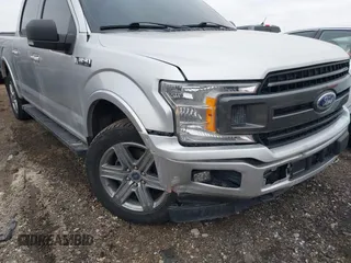 2019 Ford F-150 XL with VIN 1FTEW1E45KFB55357, listed as a IAAI auction lot 41708291 with 114,099 mi miles. Bid and sale history available at carsss.com. Image 6.