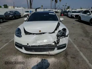 2018 Porsche Panamera 4 E-Hybrid z VIN WP0AE2A75JL130885, wystawiony jako Copart lot #55447835 z przebiegiem 76 932 mil mil oraz Szkoda całkowita • Salvage title. Historia ofert i sprzedaży dostępna na DreamBid. Obrazek 13.