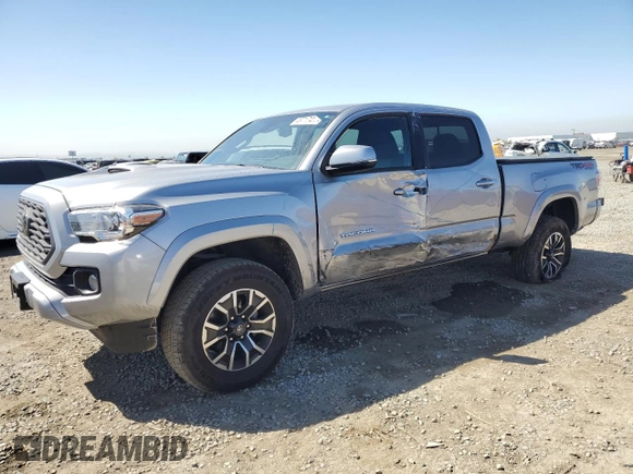2021 Toyota Tacoma 4WD SR5 with VIN 3TMDZ5BN9MM099787, listed as a Copart auction lot 49717425 with 56,374 mi miles and Salvage Title. Bid and sale history available at carsss.com. Image 1.