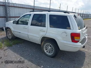 2002 Jeep Grand Cherokee Limited z VIN 1J4GX58N62C195783, wystawiony jako IAAI lot #42745397 z przebiegiem 242 502 mil mil oraz . Historia ofert i sprzedaży dostępna na DreamBid. Obrazek 3.