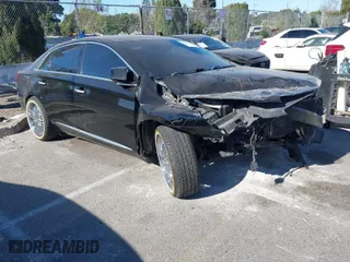 2016 Cadillac XTS Luxury Collection with VIN 2G61M5S3XG9156479, listed as a IAAI auction lot 41331374 with 129,246 mi miles. Bid and sale history available at carsss.com. Image 1.