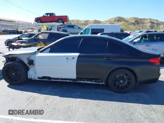 2020 BMW 5 Series 530e with VIN WBAJA9C02LCD31800, listed as a IAAI auction lot 41669765 with 99,024 mi miles and . Bid and sale history available at DreamBid. Image 15.