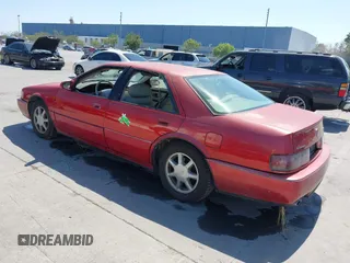 1996 Cadillac Seville Touring STS with VIN 1G6KY5290TU835414, listed as a IAAI auction lot 42051767 with 185,798 mi miles. Bid and sale history available at carsss.com. Image 3.