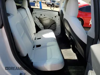 2024 Tesla Model Y Performance with VIN 7SAYGDEF6RA284171, listed as a Copart auction lot 50317205 with 6,870 mi miles and Salvage Title. Bid and sale history available at DreamBid. Image 11.