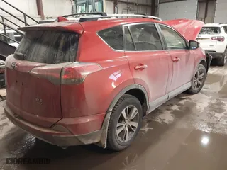 2017 Toyota RAV4 XLE with VIN JTMRFREV2HJ168971, listed as a IAAI auction lot 41504462 with 114,259 mi miles. Bid and sale history available at carsss.com. Image 4.
