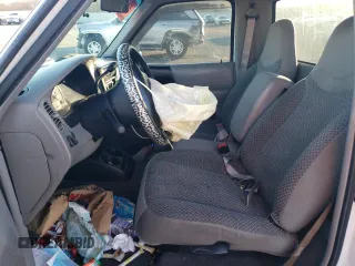 1999 Ford Ranger XLT with VIN 1FTYR10X8XUB20062, listed as a Copart auction lot 85779884 with 104,741 mi miles and Salvage title. Bid and sale history available at DreamBid. Image 7.