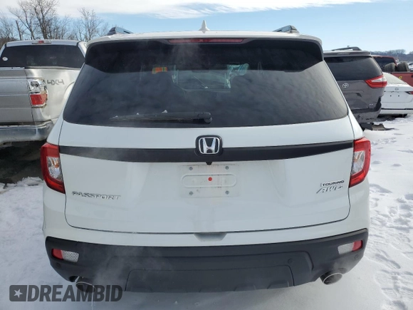 2021 Honda Passport Touring with VIN 5FNYF8H90MB035860, listed as a Copart auction lot 87910965 with 19,316 mi miles and Salvage Title. Bid and sale history available at carsss.com. Image 6.