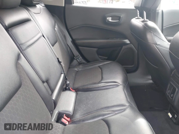 2018 Jeep Compass Altitude with VIN 3C4NJDBB1JT132052, listed as a IAAI auction lot 41622700 with 99,534 mi miles and . Bid and sale history available at carsss.com. Image 8.