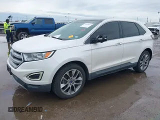 2015 Ford Edge Titanium z VIN 2FMTK3K82FBC42299, wystawiony jako IAAI lot #41912657 z przebiegiem 198 144 mil mil oraz . Historia ofert i sprzedaży dostępna na DreamBid. Obrazek 2.