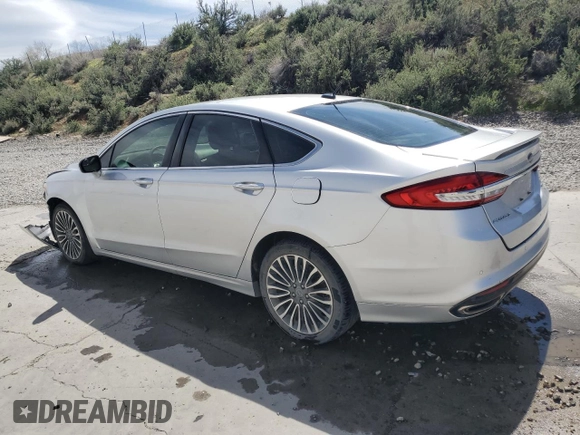 2018 Ford Fusion Titanium z VIN 3FA6P0D96JR155318, wystawiony jako Copart lot #53740505 z przebiegiem 86 567 mil mil oraz Szkoda całkowita • Salvage title. Historia ofert i sprzedaży dostępna na DreamBid. Obrazek 2.