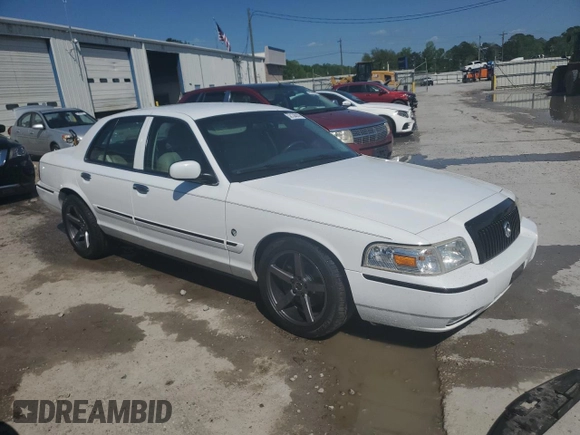 2008 Mercury Grand Marquis LS z VIN 2MEFM75V78X601929, wystawiony jako Copart lot #52130555 z przebiegiem 79 500 mil mil oraz Szkody całkowita. Historia ofert i sprzedaży dostępna na DreamBid. Obrazek 4.