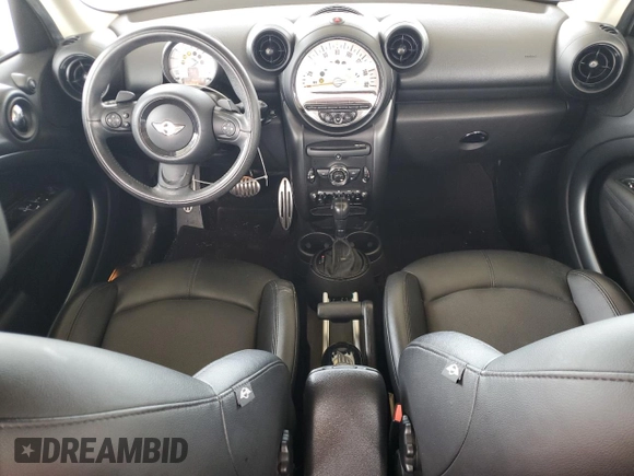 2014 MINI Countryman S with VIN WMWZC3C56EWP29211, listed as a Copart auction lot 52521145 with 91,396 mi miles and Salvage title. Bid and sale history available at DreamBid. Image 8.