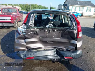 2013 Honda CR-V LX with VIN 3CZRM3H31DG703436, listed as a IAAI auction lot 42702584 with 140,013 mi miles and . Bid and sale history available at DreamBid. Image 17.