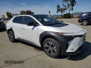 2024 Toyota bZ4X XLE with VIN JTMABACA8RA073861, listed as a Copart auction lot 50030475 with 6,465 mi miles and Salvage Title. Bid and sale history available at DreamBid. Image 4.